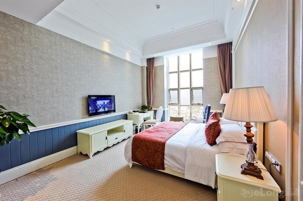 Blue Sky Hotel Yantai Esterno foto